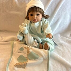 Pure organic Egyptian cotton by Under the Nile pants, top, hat, bib and toy.